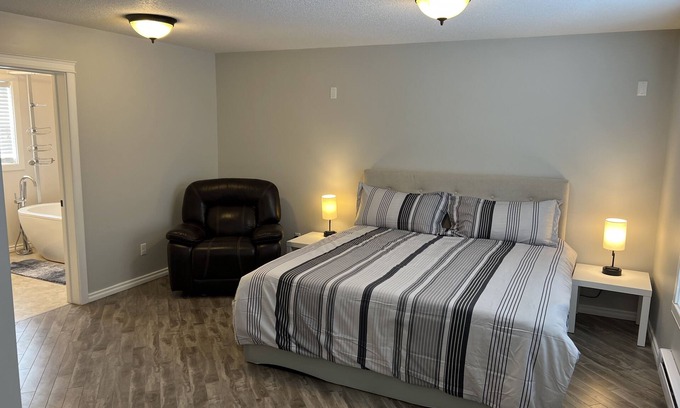 Three Hills House | King Suite with FireplacenUpper Floor Suite