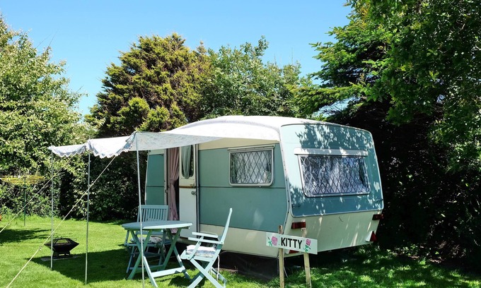 Grade Cabin | KItty unique 60s caravan set in pretty garden
