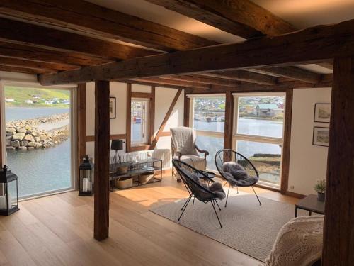 Sorvagur Apartment | Løðupakkhúsið - Historical Warehouse - Mid Floor