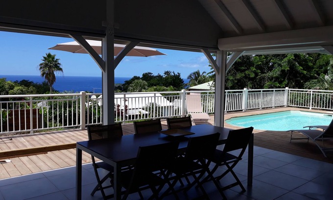 Malendure House | La Villa Tropicale, quiet, sea view and ilets Pigeon, saltwater swimming pool