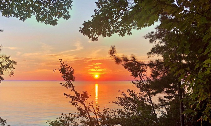 Ellsworth House | Lake Michigan Sunsets and sandy beachfront home on Grand Traverse Bay