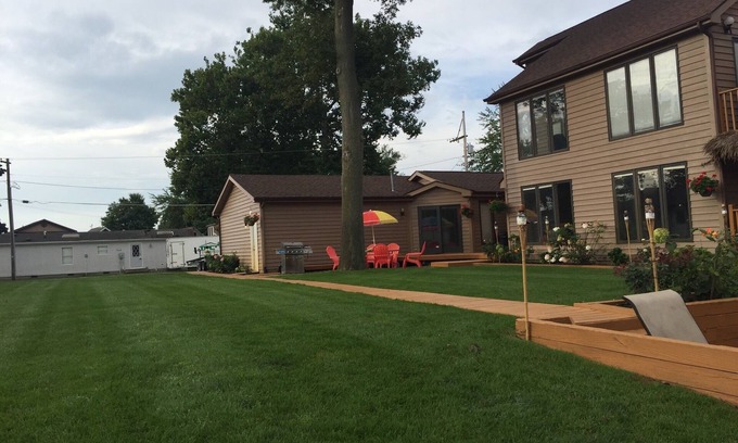 Enchanted Hills Condo | Lake Wawasee 2 Bedroom Premier Condo on Channel with 1 Boat Slip, Sleeps 6,