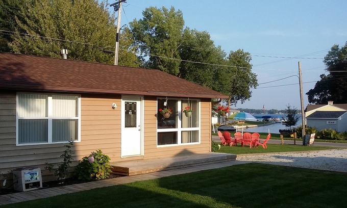 Enchanted Hills Condo | Lake Wawasee 2 Bedroom Condo on Channel . NO SHOES, NO SHIRT, NO PROBLEMS !