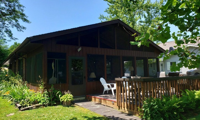 Syracuse Cottage | Lake Wawasee Pet-Friendly Cottage with Pontoon, Firepit, 3 decks, large lot