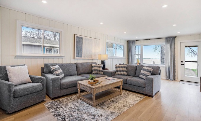 Saginaw Bay Cottage | Lakefront 3-bedroom cottage on Sand Point with AC, WiFi, King bed, Firepit