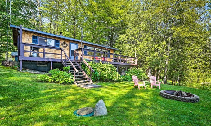 Curtis Township House | Lakefront Hideaway with Dock, Kayaks, Fire Pit!