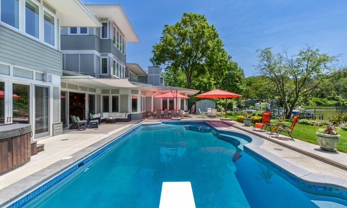 Annapolis House | Lakefront home with private pool, hot tub, outdoor space, central AC, & W/D