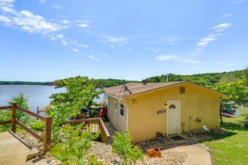 Climax Springs Apartment | Lakefront Ozark Cottage Deck with Covered Dock!