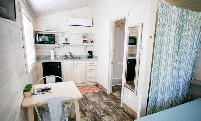 Steele Creek House | Lakefront Property Studio Cabin With Private Porch #38 at Long Cove Resort by Redawning