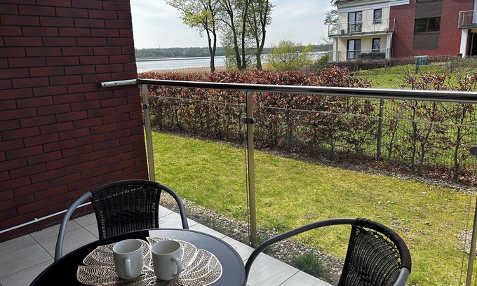 Ostroda Apartment | Lakeside Promenade View Sunset Studio