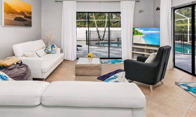 East Naples House | Larg heated pool, 3 bdrm, 2 bath, fast wi-fi, ps3, 4 smart TVs, large lanai with 2 covered areas.