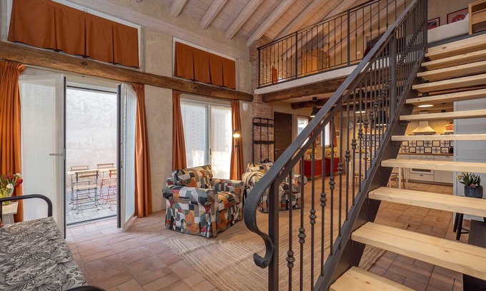 Cressa Apartment | Large Apartment with Loft and Garden in Restored Farmhouse