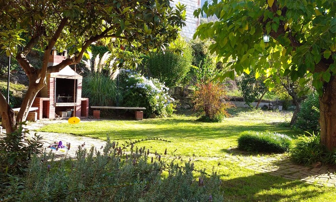 Beniatjar Cottage | Large house with enclosed plot of 2000 m2, beautiful garden and barbecue.