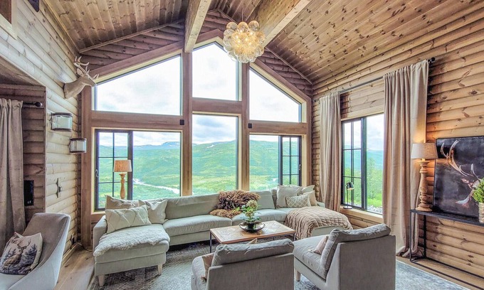 Maurset House | Large luxury holiday home with magnificent views of the mountains and the river.