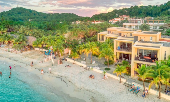West Bay Condo | Location! Location! Location! 3 Bedroom Condo Located Right on West Bay Beach