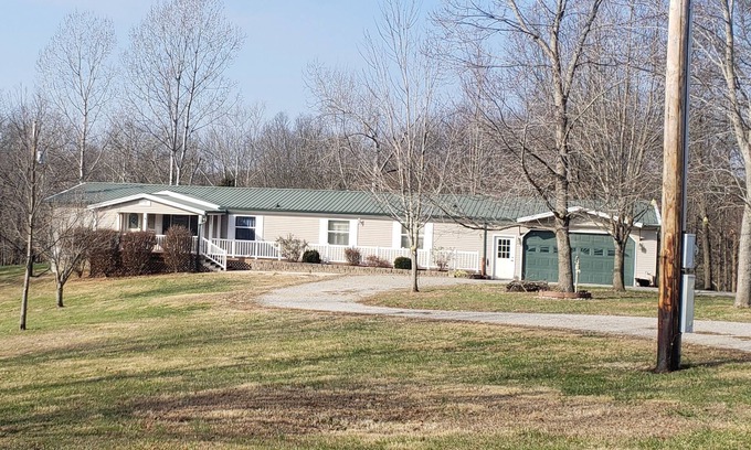 Ava House | Lodge at the Longbranch next to the Longbranch Saloon