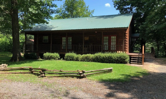 Heber Springs Cottage | Log Cottage on the Little Red River with hot tub.