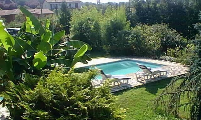 Saint-Etienne-de-Maurs Apartment | Lot /Cantal limit in wooded park charming apartment 4 people swimming pool.