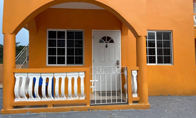 Savanna la Mar Apartment | Lovely 1-bedroom unit, gated with parking and a/c