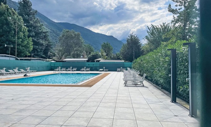 Dervio Apartment | Lovely apartment for 4 guests with A/C, WIFI, pool, TV, patio and panoramic view