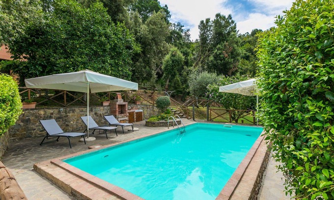 Castagneto Carducci Villa | Lovely apartment in villa for 5 guests with A/C, pool, WIFI, TV, patio and pets allowed