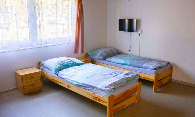 Hradec Kralove House | Lovely apartment in villa for 12 people with WIFI, TV, patio, pets allowed and parking