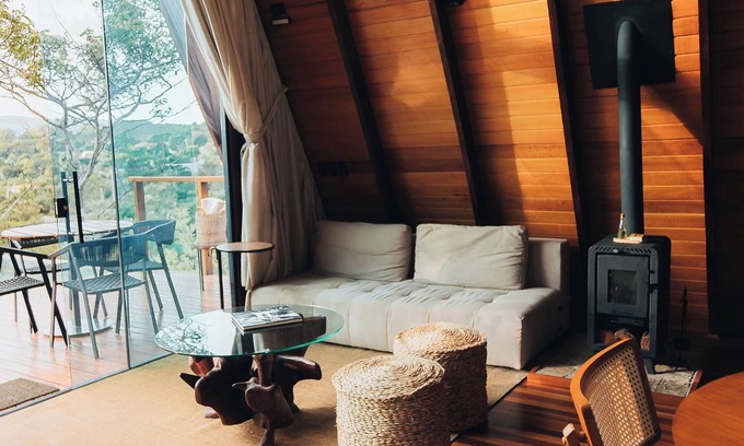 Alto Paraiso de Goias Cabin | Lume Cabin, A-frame cabin that combines comfort and elegance.