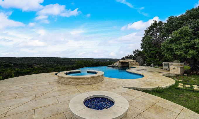 Oatmeal House | Luxe designer Hill Country home near Austin with amazing views & infinity pool