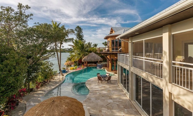 Marathon Villa | Luxe Waterfront Retreat-2 Pools-Beach-Spa-Dock-Bar