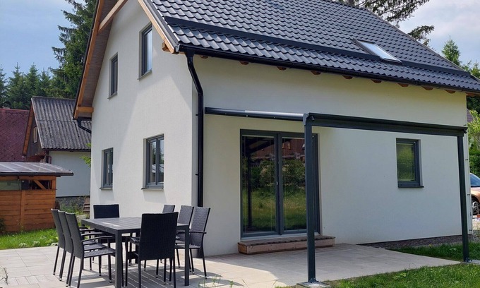 Karlovy Dvory Ski Chalet | Luxurious, newly built vacation home near the Lipno reservoir with sauna.