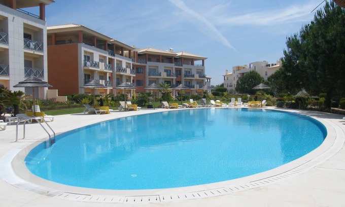 Montechoro Apartment | Luxurious spacious apartment with balconies overlooking pool & gardens A/C Wifi