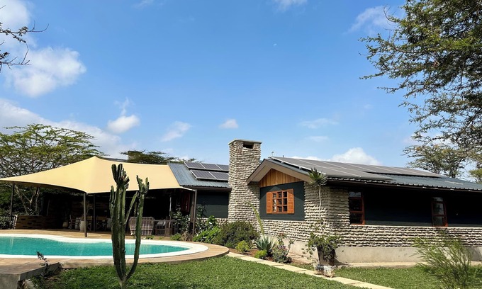 Nairobi Ski Chalet | Luxurious super cosy chalet surrounded by nature with own pool near Nairobi.
