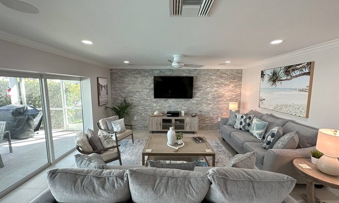 Isles of Capri House | Luxurious Waterfront Retreat! Oversized Heated Pool and expansive outdoor area!