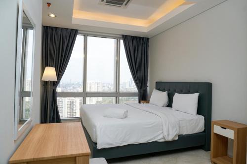 Karet Apartment | Luxury 2BR at The Masterpiece Condominium Epicentrum Apartment By Travelio