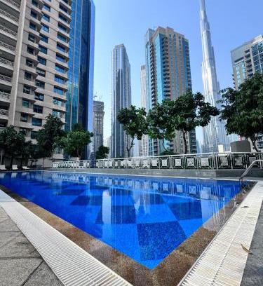 Downtown Dubai Apartment | Luxury Burj Khalifa & Fountain View Apartments Steps to Dubai Mall by Simply Comfort