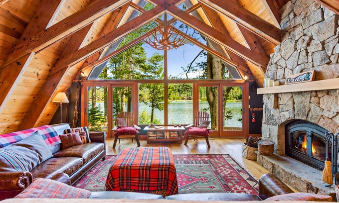 Serene Lakes House | Luxury lakefront home with private hot tub, on-site dock, fireplace & HOA beach
