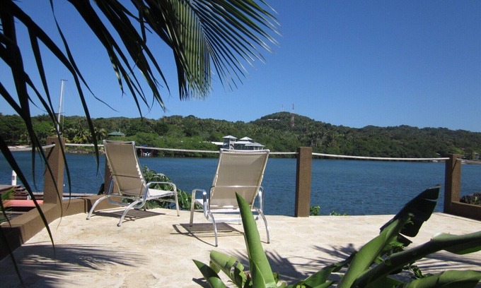 Antoneys Cay Condo | Luxury Waterfront Condo w/Pool, Dock, and Gardens