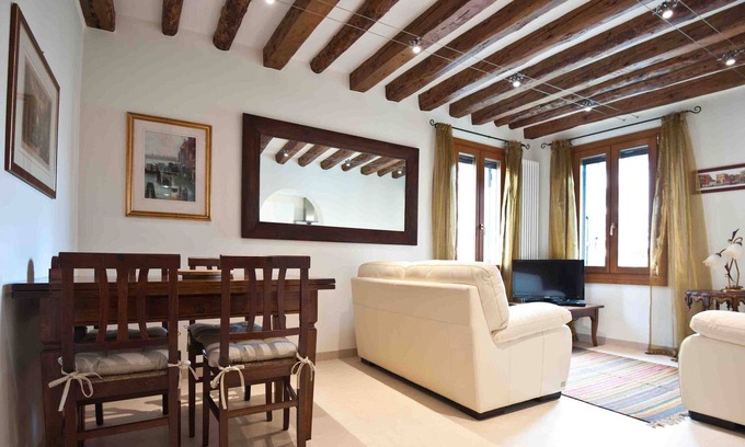 Santa Croce Apartment | Luxury Waterside Apartment With Courtyard Garden