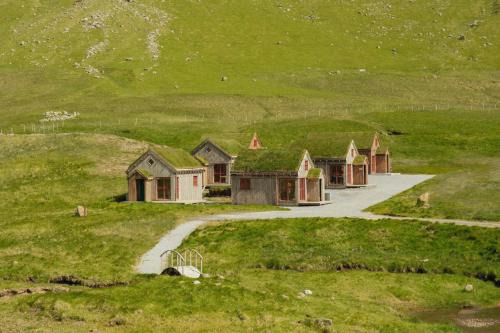 Gasadalur House | Múlafossur Cottages by famous waterfall in Gásadalur