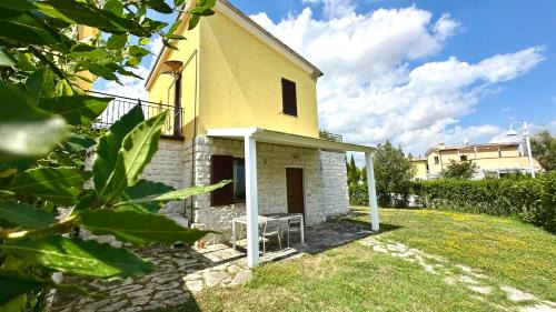 Numana Apartment | M375 - Marcelli, bilocale con giardino in residence con piscina