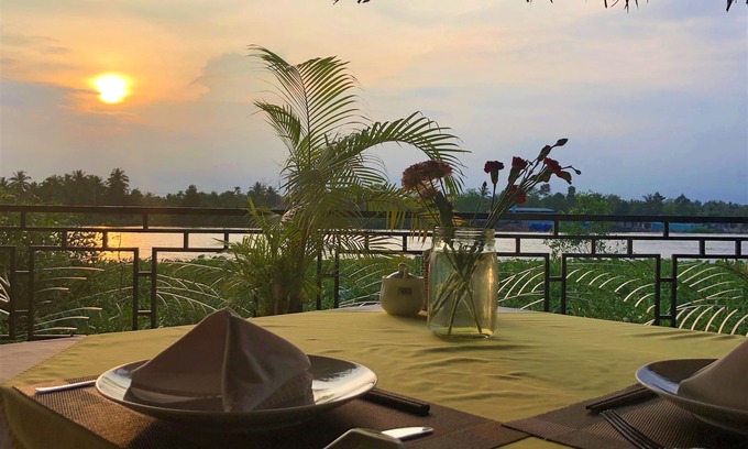 Giong Trom Hotel | Mango Home Riverside