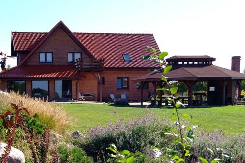 Pasym Villa | Mazury całoroczny dom nad jeziorem do wynajęcia z własną linią brzegową