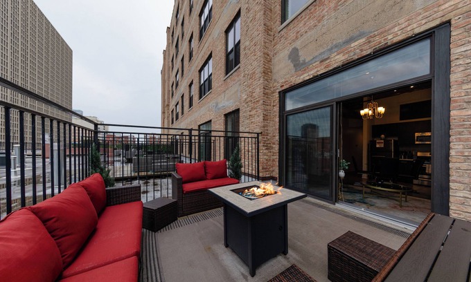 Near South Side Apartment | McCormick Place Patio skyline unit with optional Parking for up to 6 people