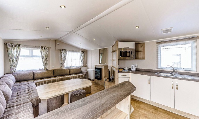 Bleadon House | Modern and contemporary 12ft-wide caravan with one double and one twin.
