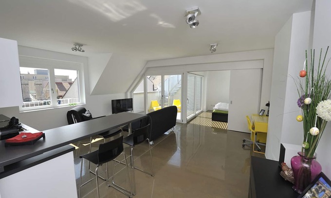Rudolfsheim-Funfhaus Apartment | Modern, Architect-Designed Penthouse Loft With 2 Outdoor Roof Terraces