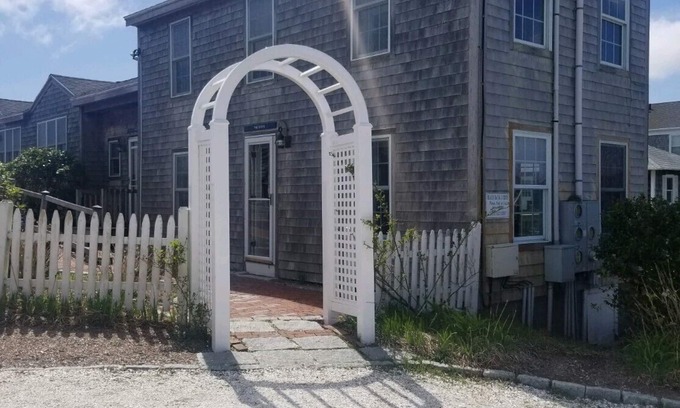 West Yarmouth Condo | Modern beachfront cottage newly renovated steps from warmest beach!