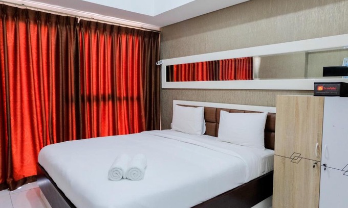 Pagedangan Apartment | Modern & Comfy Studio @ Casa De Parco Apartment By Travelio