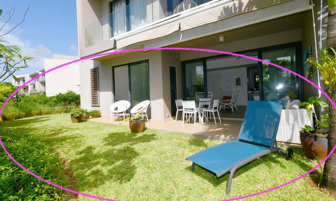 Roches Noires Apartment | Modern ground-floor apartment, wifi, private garden