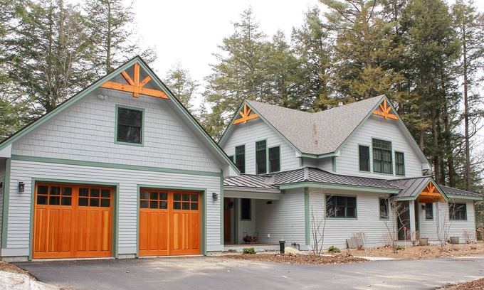 Center Harbor House | Modern home with a fireplace, ping pong, canoe, washer/dryer & central AC
