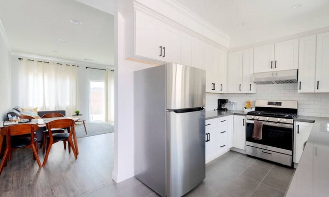 Azusa House | Modern Space Hideaway : w/2 King Beds, 2 Baths, Full Kitchen, a Pull-Out Sofa, with Backyard Patio and Gated Parking.